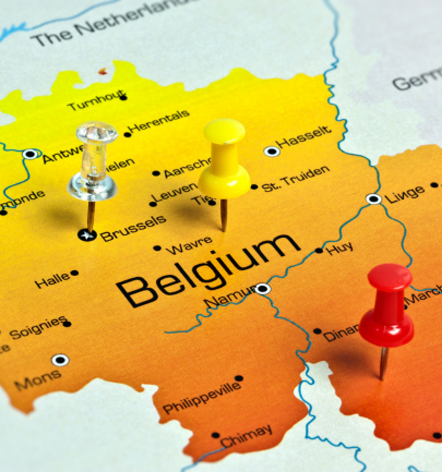 A detailed map of Belgium with location pins marking key workforce housing areas.