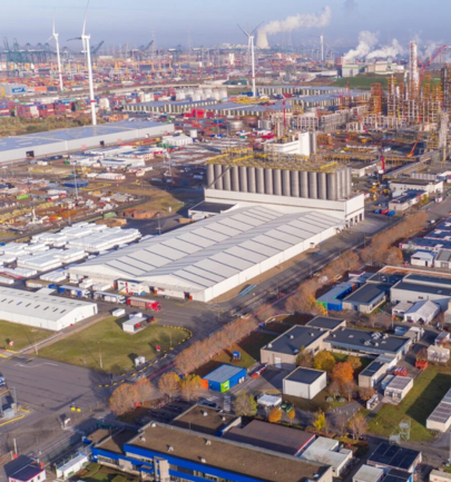 Aerial view of Antwerp's industrial zone, highlighting key areas for workforce housing.